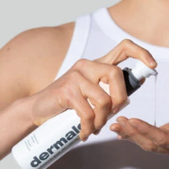 Dermalogica Daily Glycolic Cleanser -Skin Central daily glycolic cleanser being dispensed into hands 81832.1659045988